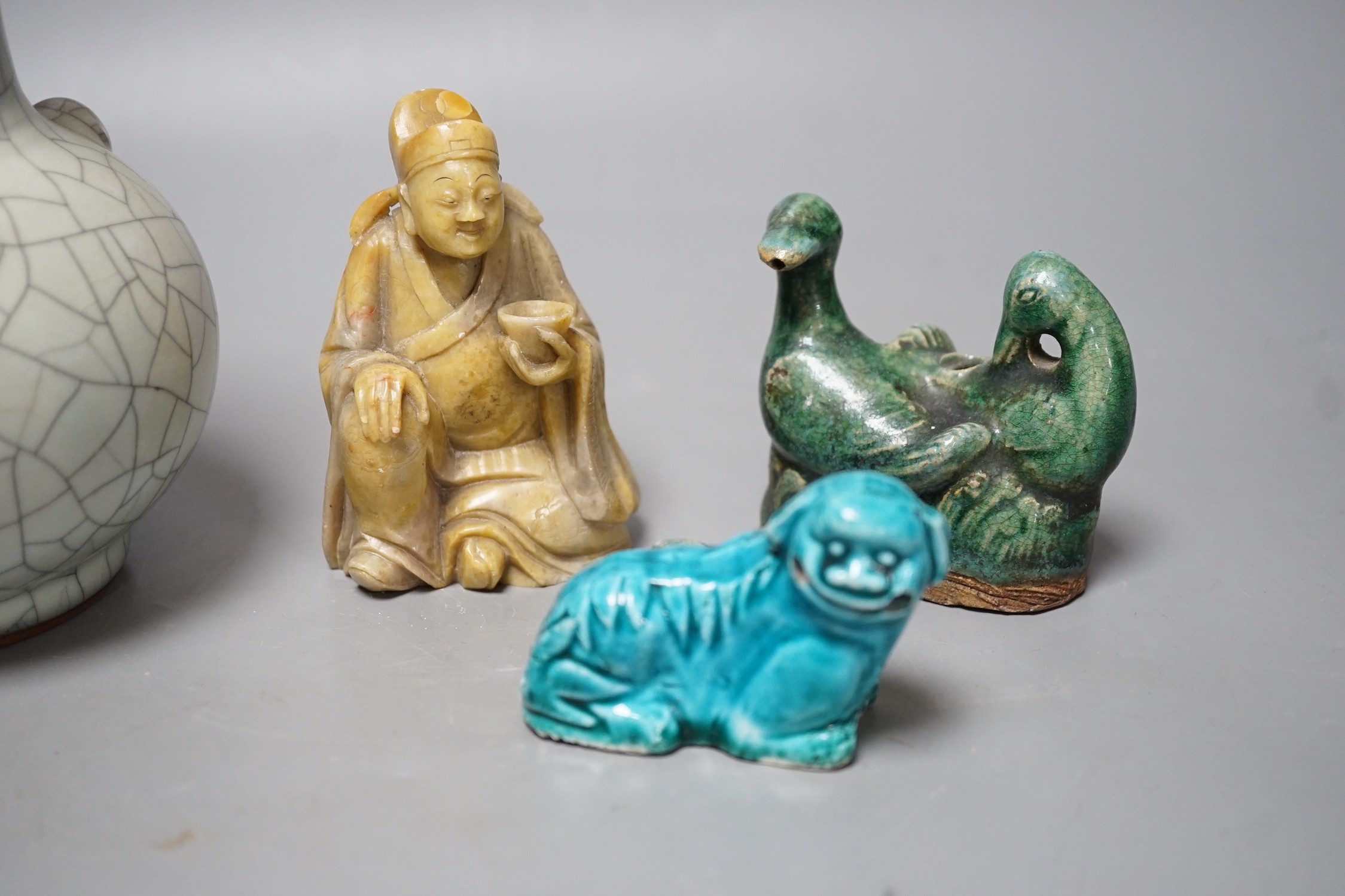 A Chinese crackle glaze vase, 15.5 cm high, two incense holders and a soapstone figure